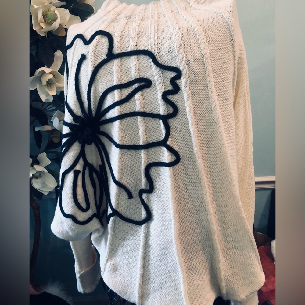 Elegant White Sweater with Famous Black Chanel Magnolia Design